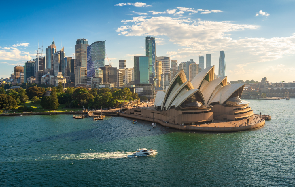 View of the Sydney Opera House overlooking Sydney Harbour on a clear day.